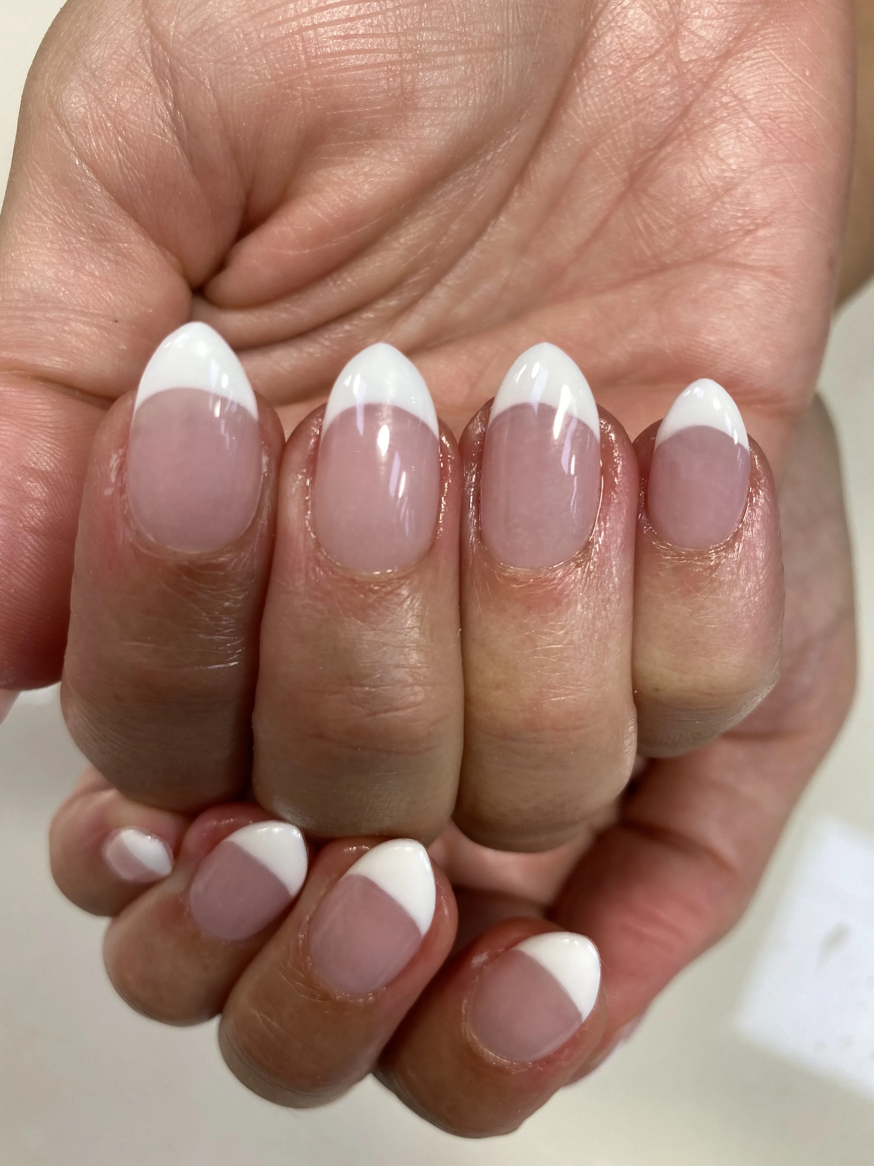 Classic white-tip French manicure, perfectly finished at Organique Beauty South Yarra